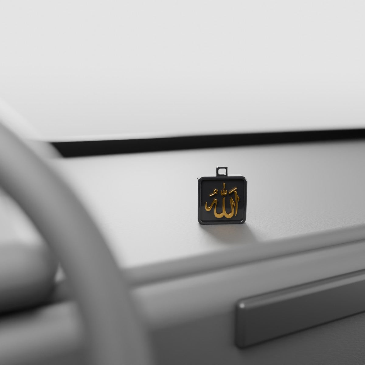 The Allah collectible standing on a car dashboard