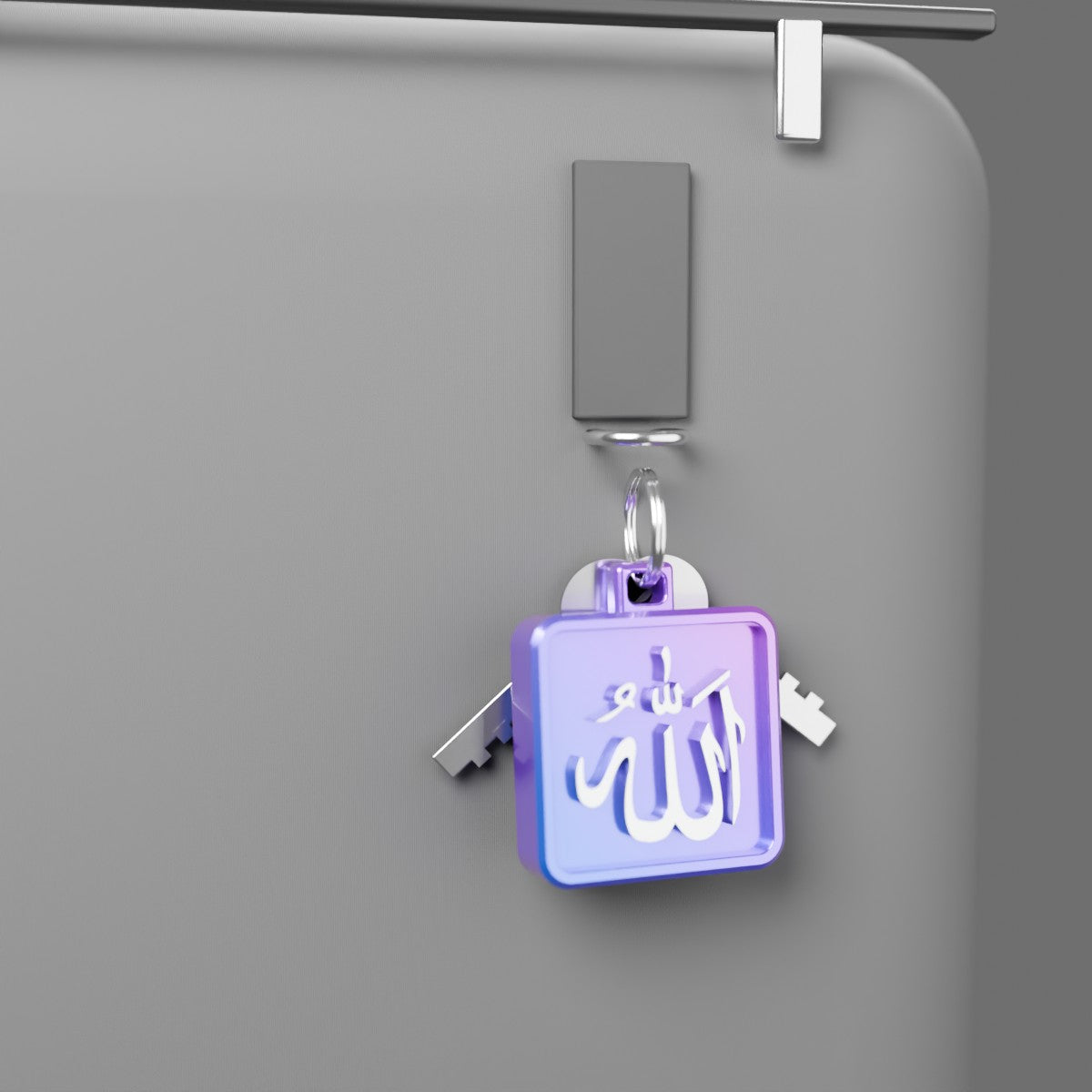 The Allah collectible on a key ring with keys, clipped to a bag