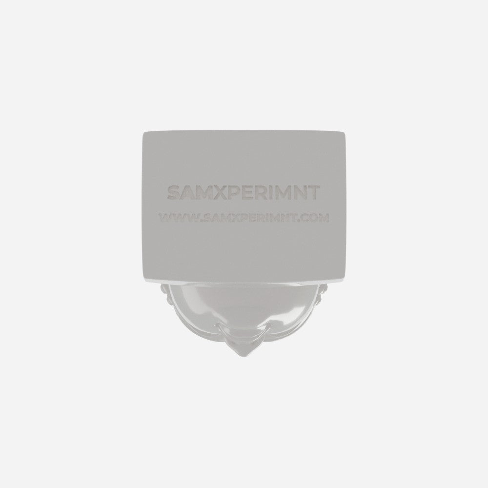 Underside of the Buddha Bust plinth with the samxperimnt logo and website debossed