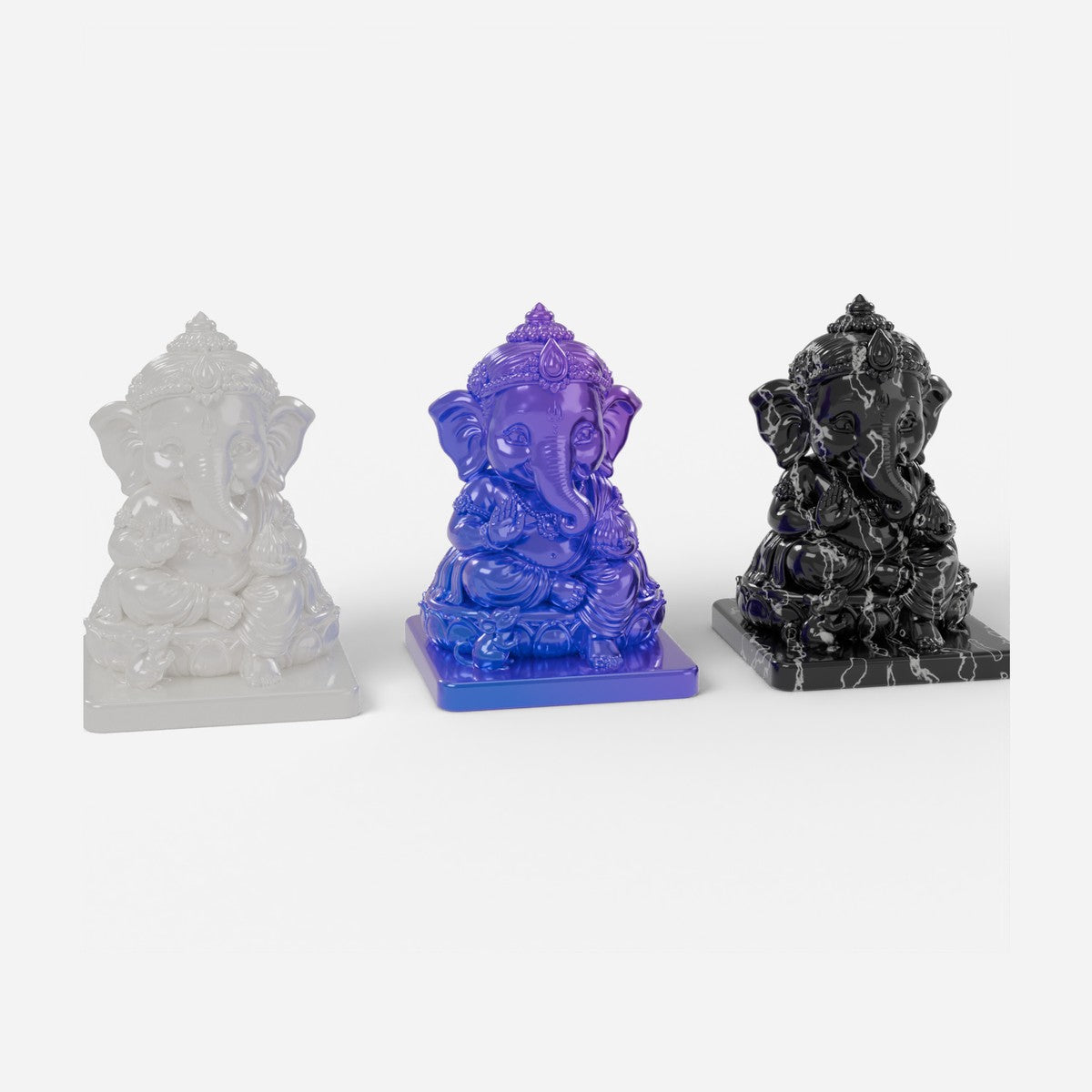 Ganesha in all three colours: pearl white, colour-shift blue-purple and black marble